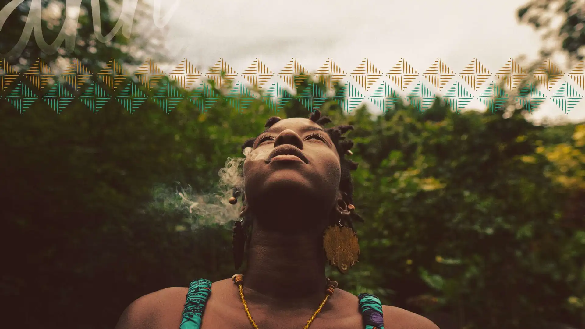 Black Jamaican woman blows smoke with her head raised